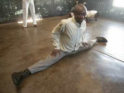 A man doing the sideways splits