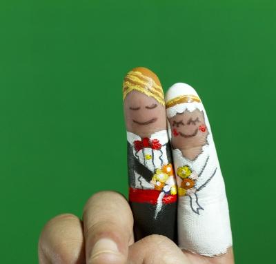 A picture of fingerpainted wedding couple 