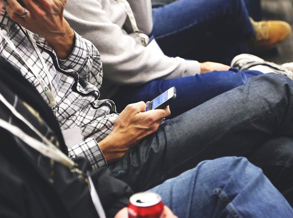 smartphones in class by StartupStockPhotos