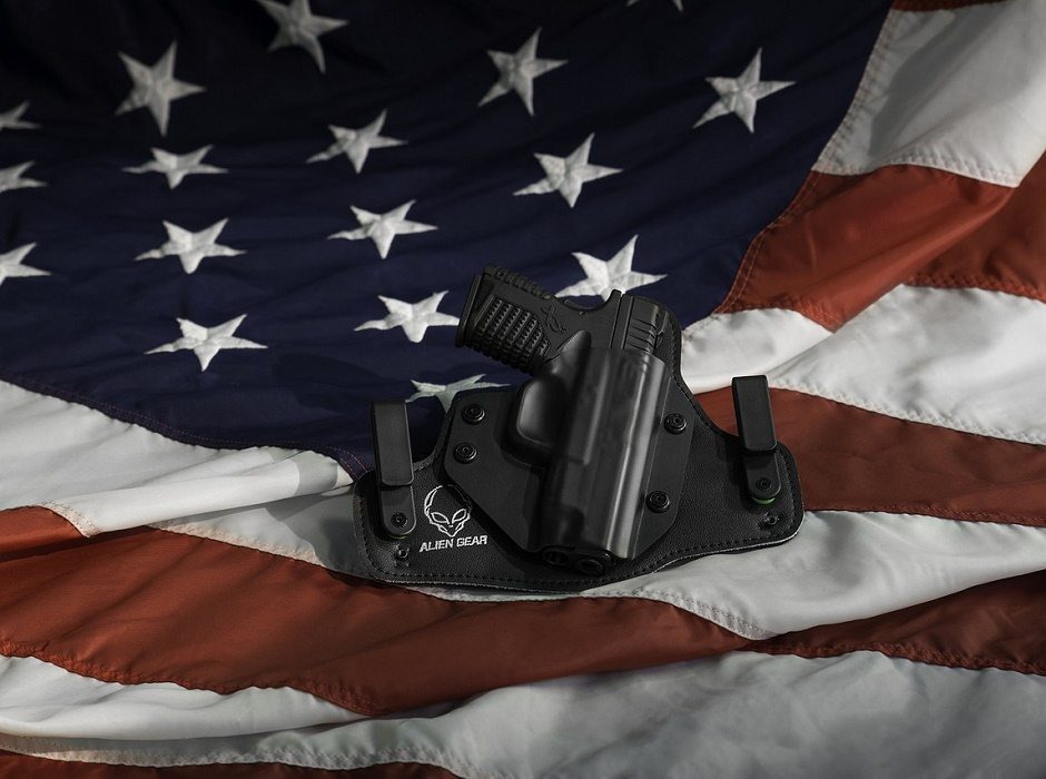 handgun and flag by Ibropalic