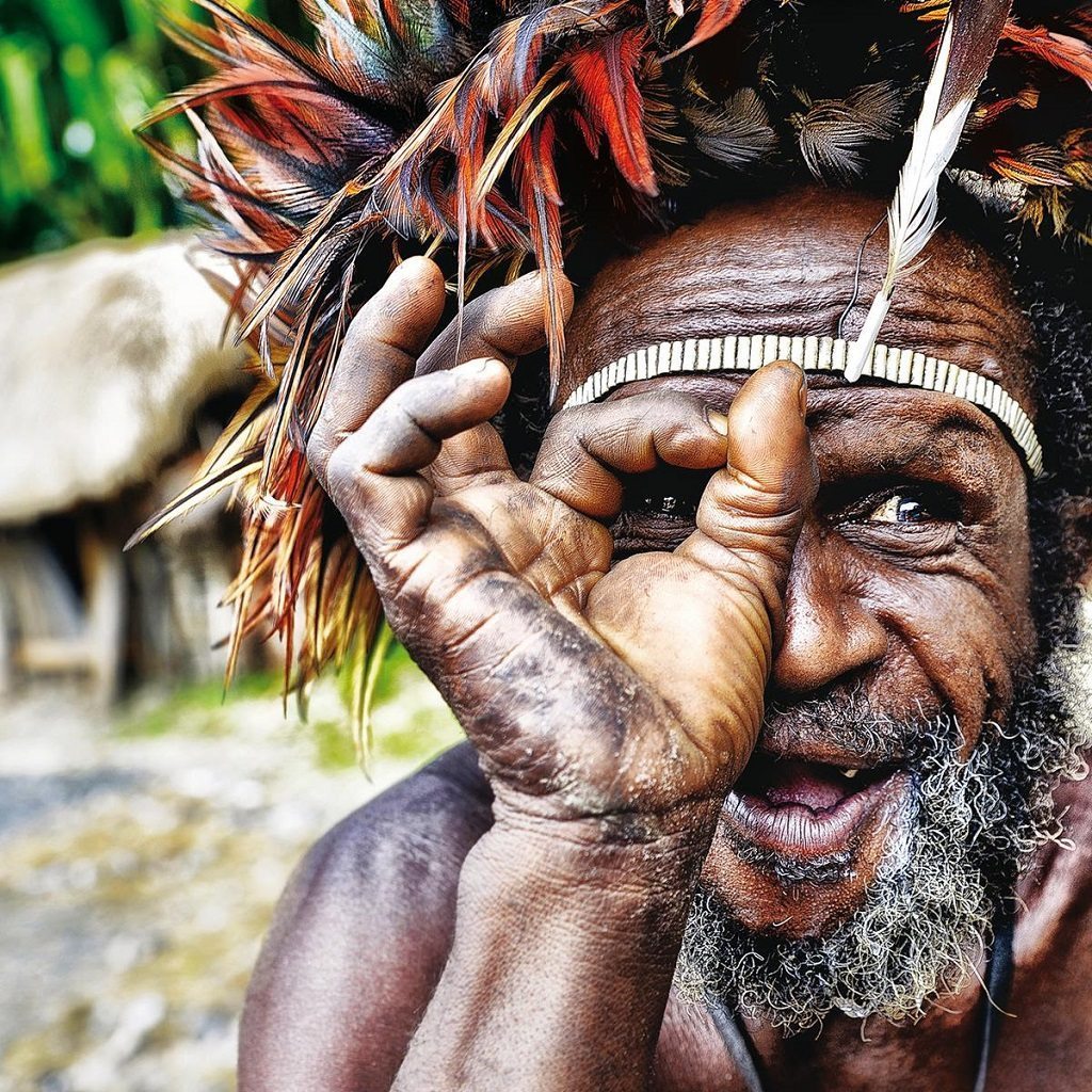 Dani man in West Papua by Magda Zelewska © Magda Zelewska