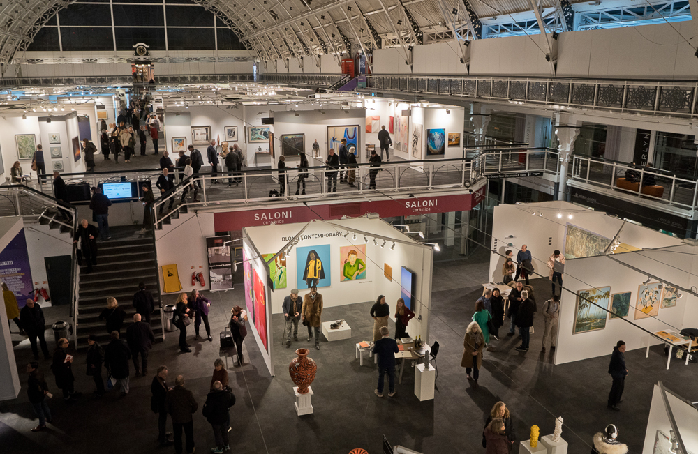 Galleries and visitors at the 2023 London Arts Fair, Islington,London,England,UK