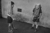 Markéta Luskačová, Two boys with their jumpers over their heads, Booker Avenue Primary School, Liverpool (1988)