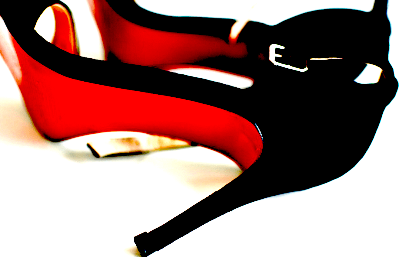 Image shows a pair of high heeled shoes