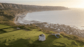 Image shows aerial view of Folkestone town and beach.