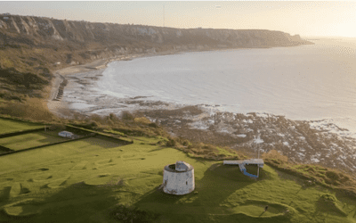 Image shows aerial view of Folkestone town and beach.