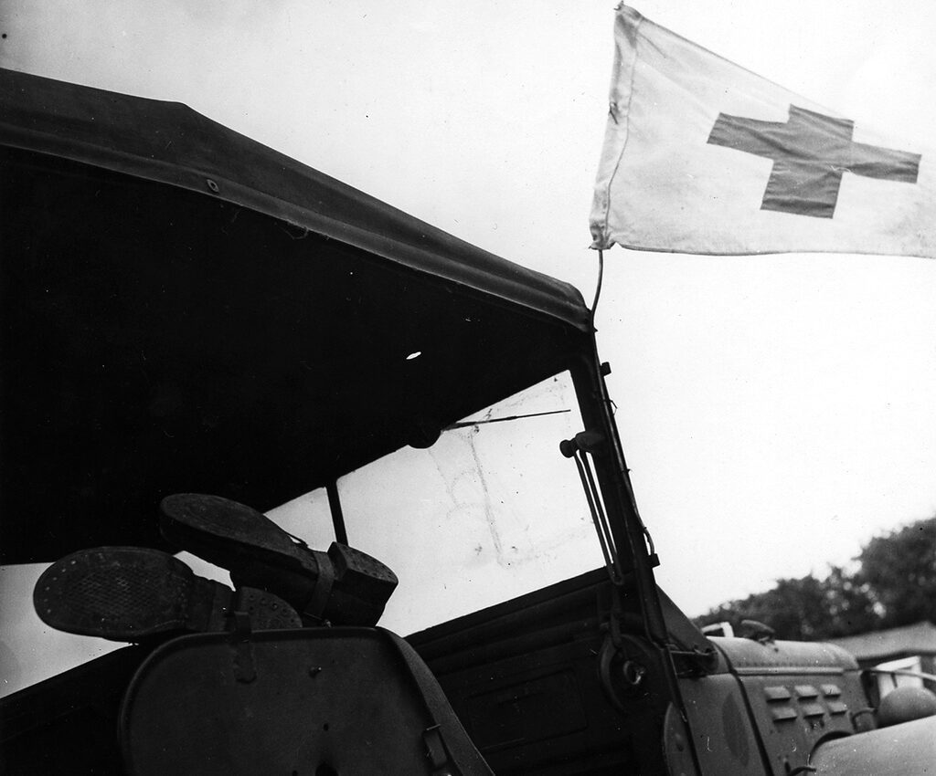 This picture was taken on Lee Miller's her first assignment in Europe covering the war. The piece which was written and photographically illustrated by Lee was published in British Vogue, titled ‘Unarmed Warriors’ and in American Vogue as ‘USA Tent Hospital in France’. Her opening lines are striking and show how close she still felt to the country she had lived in over 10 years before; ‘As we flew into sight of France I swallowed hard on what were trying to be trying to be tears and remembered a motive actress kissing a handful of earth. My self-conscious analysis was forgotten in greedily studying the soft, grey skied panorama of nearly a thousand square miles of France... of freed France’ - British Vogue, September 1944.