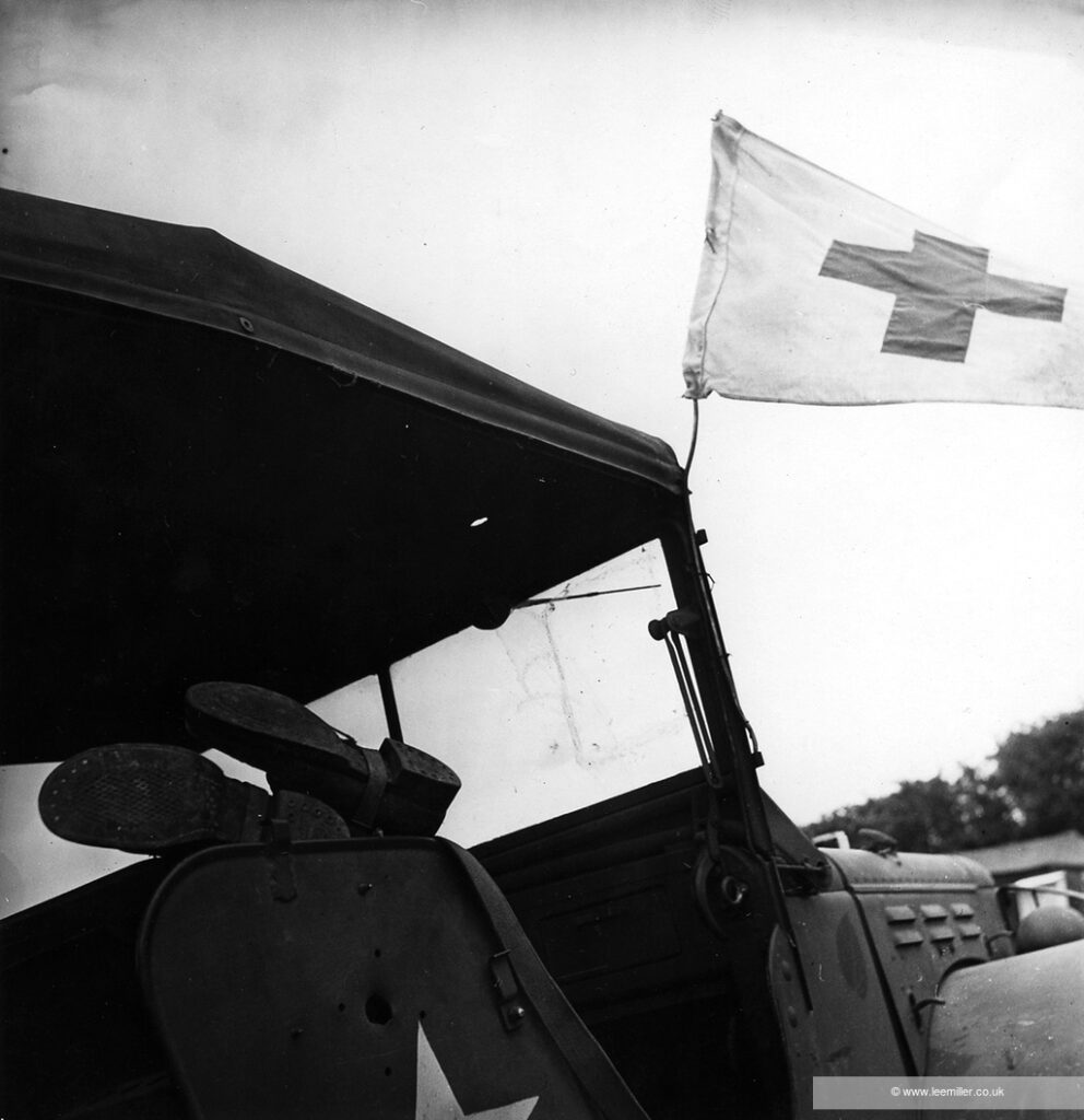 This picture was taken on Lee Miller's her first assignment in Europe covering the war. The piece which was written and photographically illustrated by Lee was published in British Vogue, titled ‘Unarmed Warriors’ and in American Vogue as ‘USA Tent Hospital in France’. Her opening lines are striking and show how close she still felt to the country she had lived in over 10 years before; ‘As we flew into sight of France I swallowed hard on what were trying to be trying to be tears and remembered a motive actress kissing a handful of earth. My self-conscious analysis was forgotten in greedily studying the soft, grey skied panorama of nearly a thousand square miles of France... of freed France’ - British Vogue, September 1944.